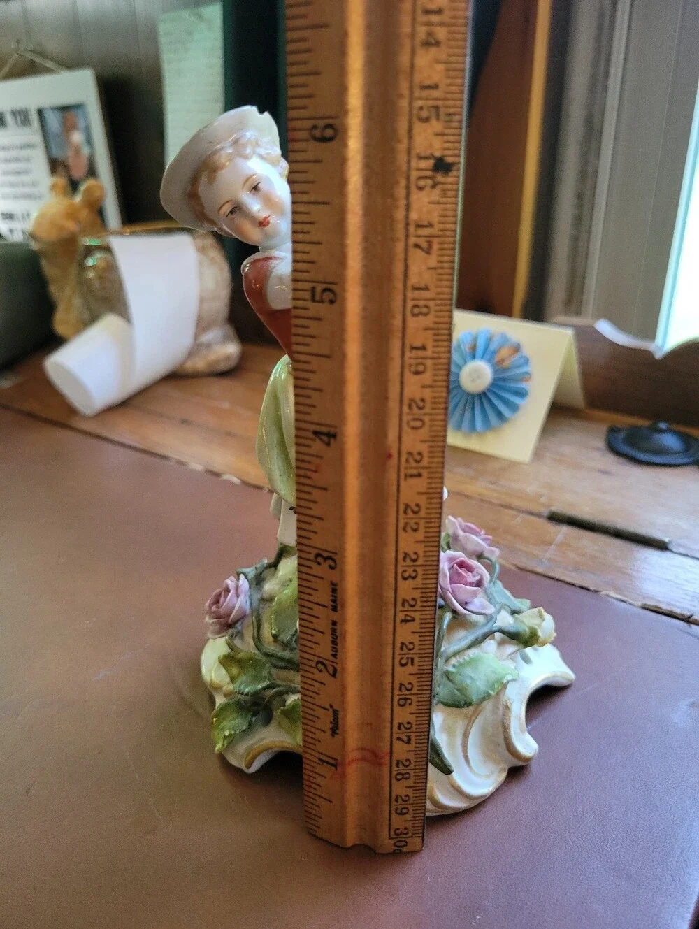 antique porcelain figurine, likely German from around 1900-repaired